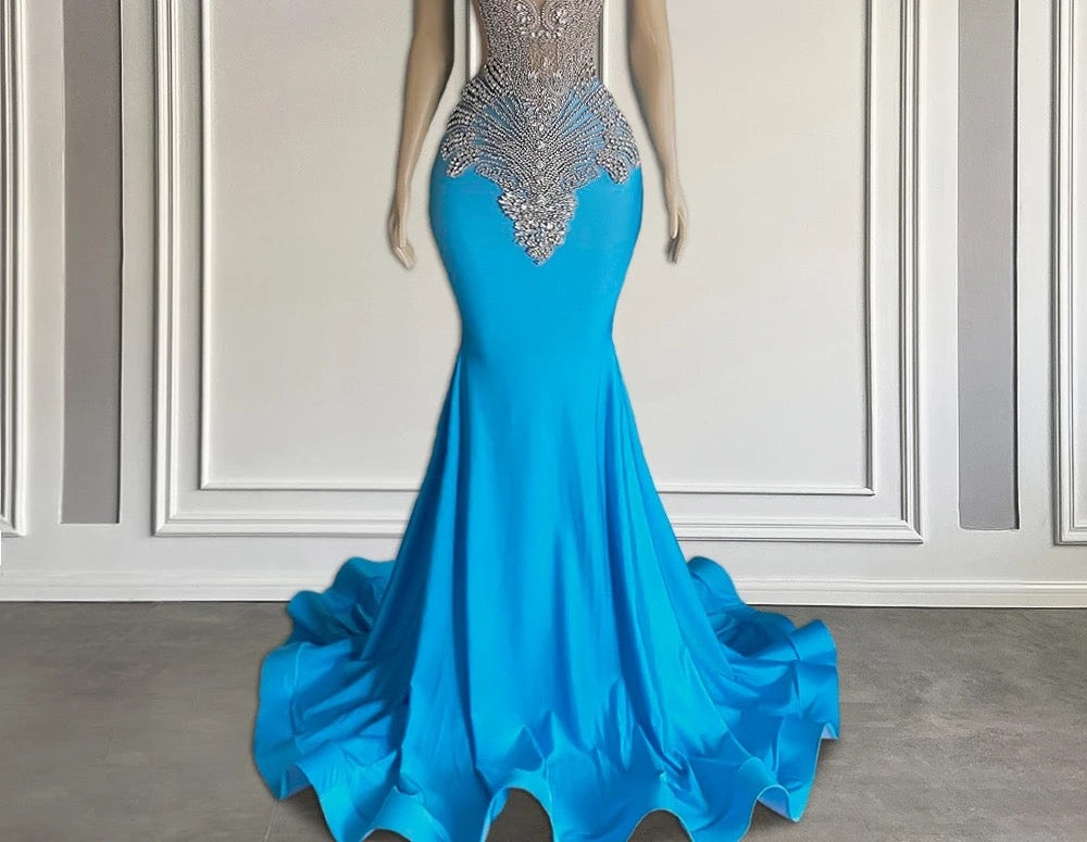 Ocean blue sleeveless mermaid prom dress with long beadings
